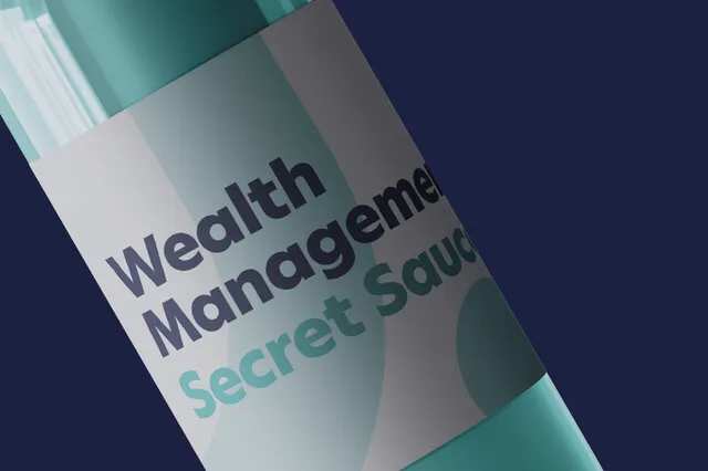A close-up photo of a label on a bottle. The label is blue and reads "Wealth Management Secret Sauce".